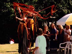 stiltwalkers & singers